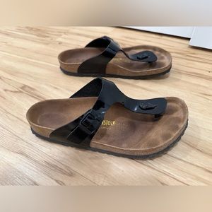 Very lightly used, great condition, Birkenstock women’s shiny black flip flops